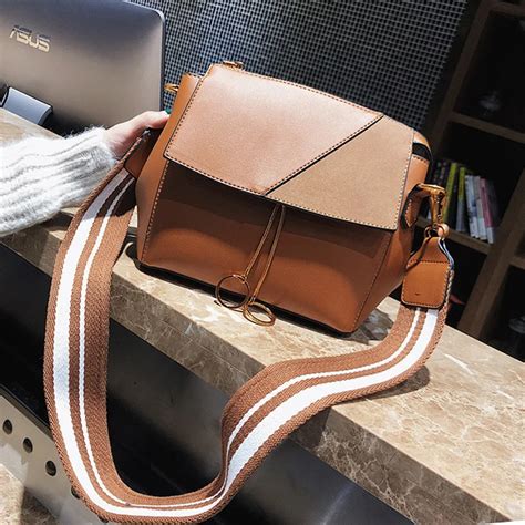 wide shoulder strap handbags